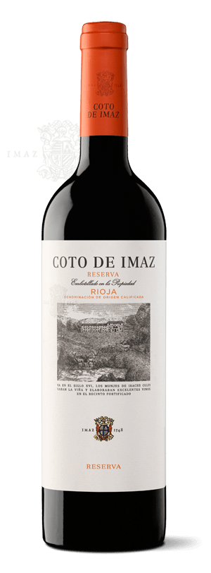 una botella de vino coto de imaz reserva